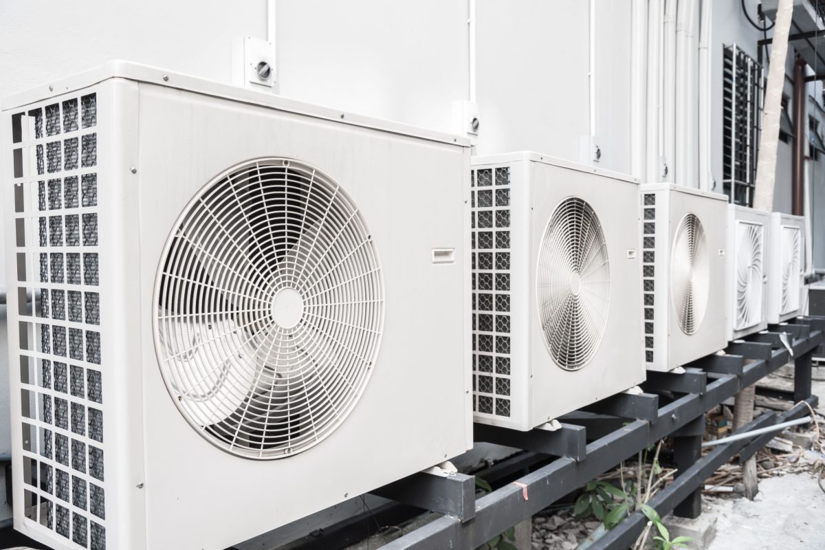 Close-up of multiple outdoor air conditioning units.