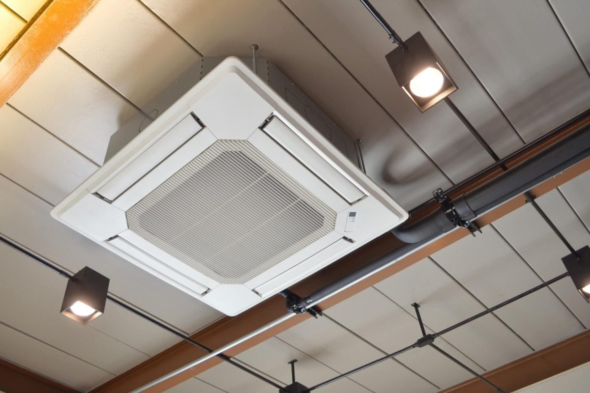 Ceiling cassette air conditioning unit installed in commercial space.