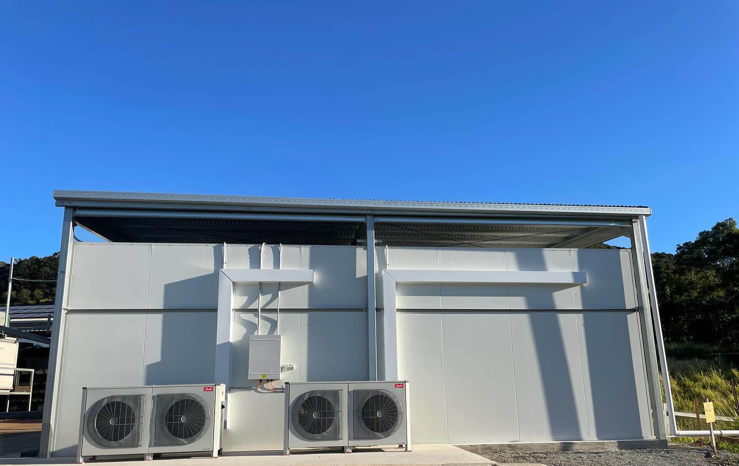 Outdoor air conditioning units installed on a commercial building.